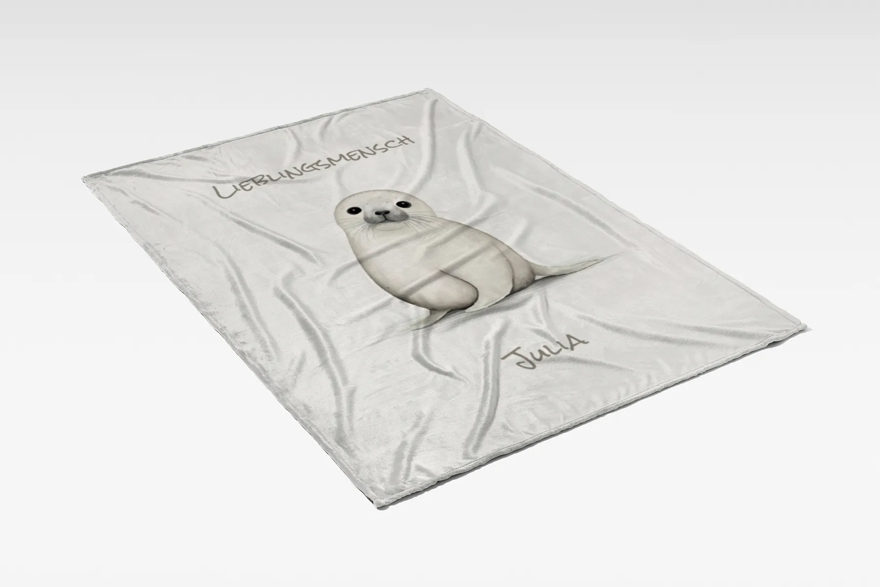 Kuscheldecke Kleine Robbe beige 140 x 200 cm
